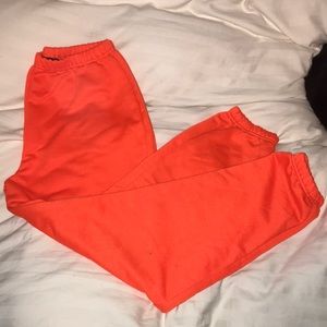 Orange joggers from pretty little thing